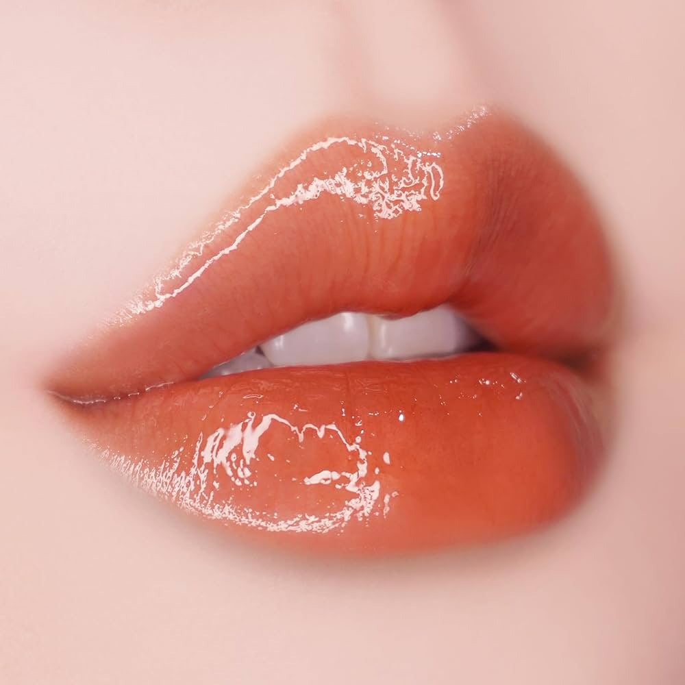 UNLEASHIA Popcorn Syrup Lip Plumper - No. 2 Mango Caramel