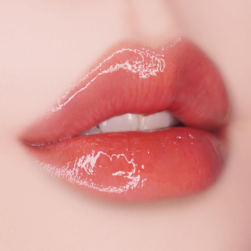 UNLEASHIA Popcorn Syrup Lip Plumper - No. 4 Honey Grapefruit