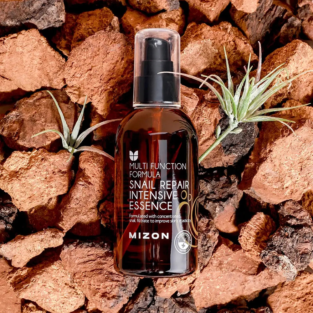 MIZON Schnecken-Reparatur-Intensiv-Essenz - formuliert mit Schneckenschleim und Hyaluronsäure, die zur Hautfeuchtigkeit und zum Gleichgewicht von Wasser und Talg beitragen - 100 ml