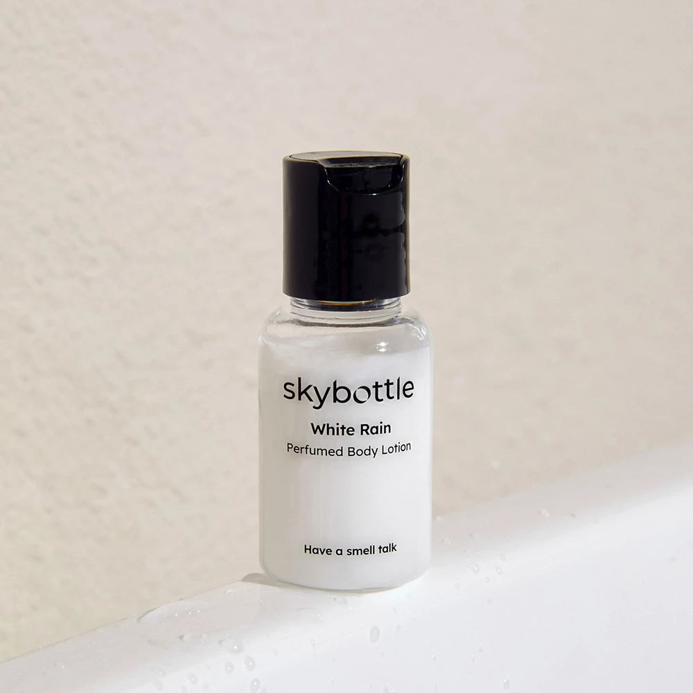 SKYBOTTLE White Rain Parfümierte Körperlotion - Körperlotion mit Sheabutter und Bergamotte, die zur Feuchtigkeitsversorgung der Haut und zur Aufrechterhaltung ihrer natürlichen Feuchtigkeitsbarriere beiträgt, 30-ml-Version, perfekt für Reisen - 30 ml